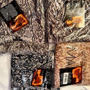 Four sets of Iman from HSN size 1x